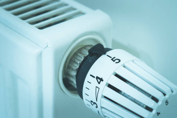 istock Heat regulator on a heater, close up picture. Heating Costs. 1175266770