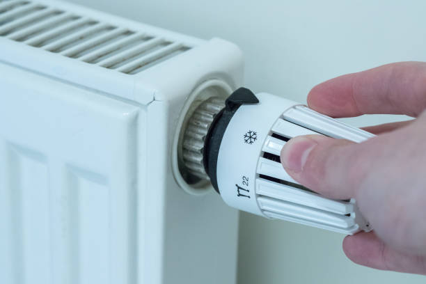 istock Heat regulator on a heater, close up picture. Heating Costs. 1175267144