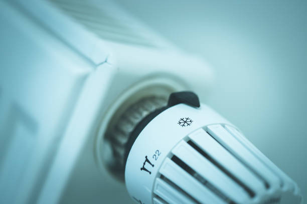 istock Heat regulator on a heater, close up picture. Heating Costs. 1175268064