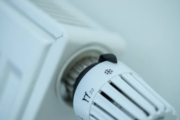 istock Heat regulator on a heater, close up picture. Heating Costs. 1175268114