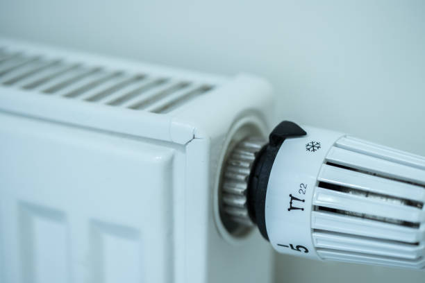 istock Heat regulator on a heater, close up picture. Heating Costs. 1175269455