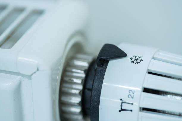 istock Heat regulator on a heater, close up picture. Heating Costs. 1175269660