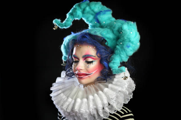 girl in makeup and costume jester . - harlequin mask black sadness imagens e fotografias de stock