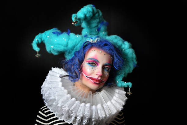 girl in makeup and costume jester . - harlequin mask black sadness imagens e fotografias de stock