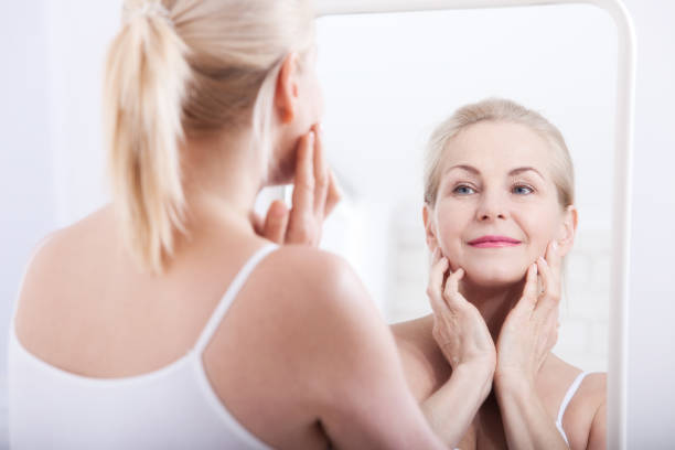 istock Fourty years. Wrinkles on forehead and face. Face plastic. 1175272801