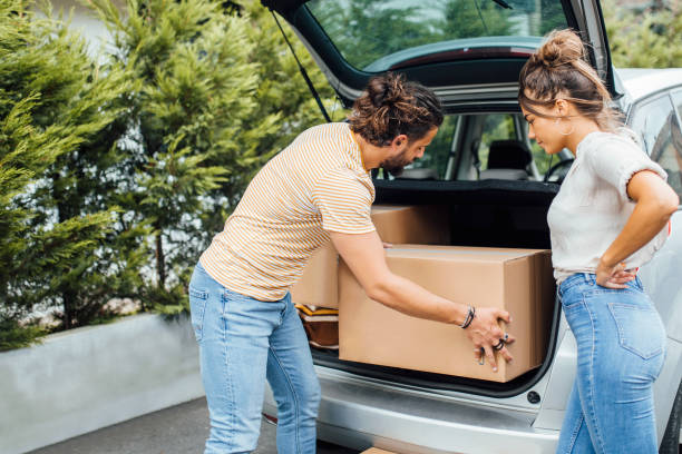 istock Young millennial couple moving 1175273125