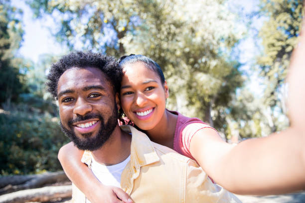 istock Carefree Diverse Couple in Nature 1175279052