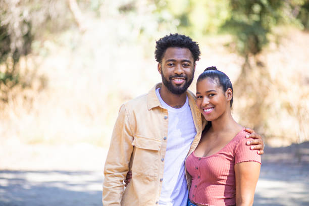 istock Diverse Young Couple Hanging Out 1175280362