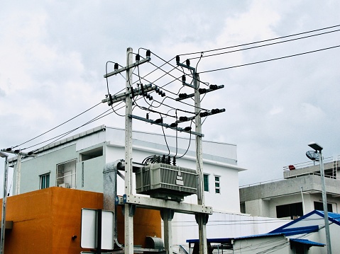 Chaos of Wires, Tranformer and Electric Wires on The Pole at Bangkok, Thailand.