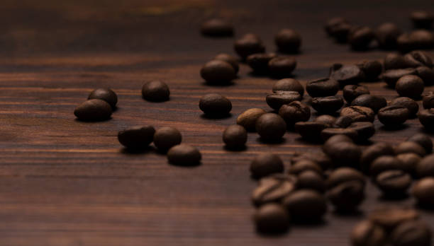 coffee beans on wooden background. - coffee cup bean sugar imagens e fotografias de stock
