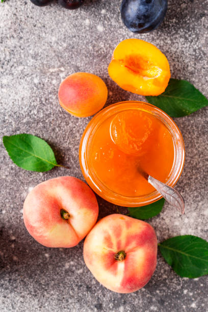 istock Apricot jam in glass jar 1175285660