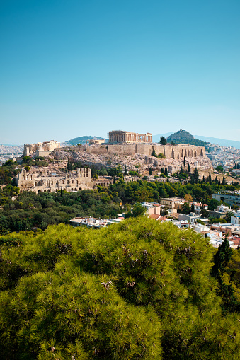 View of the main attraction of the city, the Acropolis. City landscape. Athens, Greece.