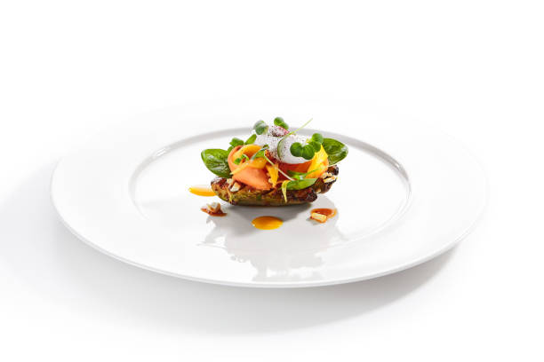 istock Exquisite serving avocado with mozzarella cream and dried tomato jam 1175286237