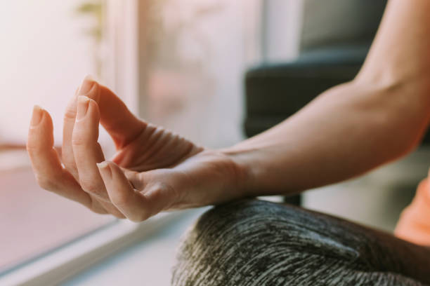 istock hand closeup with yoga gesture 1175286368