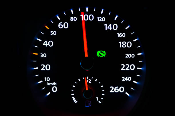 istock Modern light car mileage on black background 1175287531
