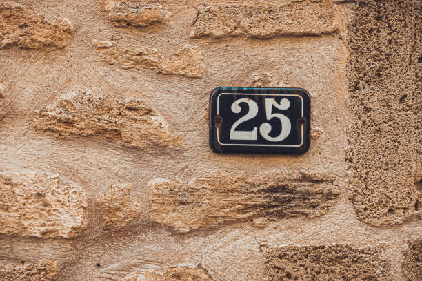 istock number 25 door sign at majorca 1175287634
