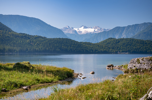Panorama of the beautiful lake Altaussee with the famous Dachstein Glacier in back. Nature Reserve with Drinking Water Quality. Austrian Alps Panorama. Nikon D850. Converted from RAW.