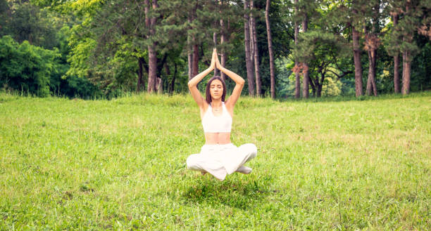 istock Young girl practicing funny exercising at the nature 1175292151