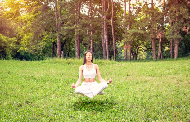 istock Young girl practicing funny exercising at the nature 1175292364