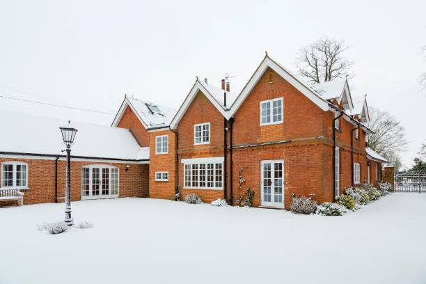 istock Country house in winter snow 1175292392