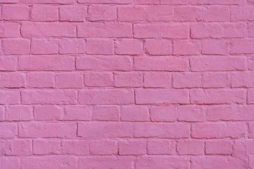 Pink brick wall background and texture