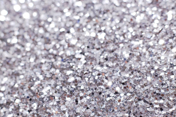 istock Silver glitter texture. Festive sparkling sequins background. Wpaper for Valentine, New Year or Christmas Holidays 1175292572