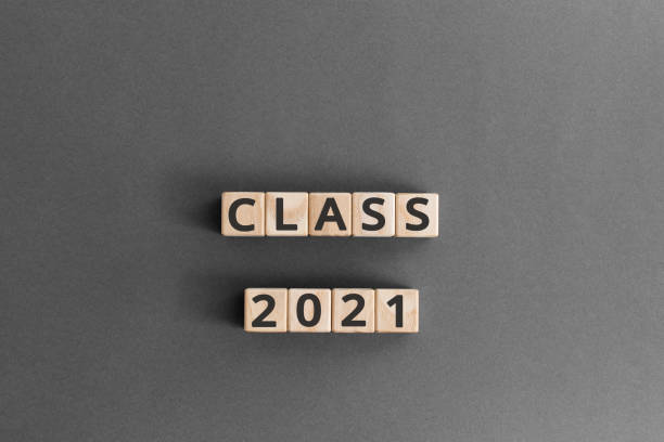 istock Class 2021 - word from wooden blocks with letters 1175294198