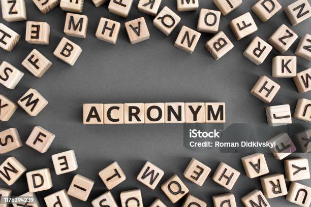 Acronym Word From Wooden Blocks With Letters Stock Photo - Download Image Now - Acronym, Education, Concepts