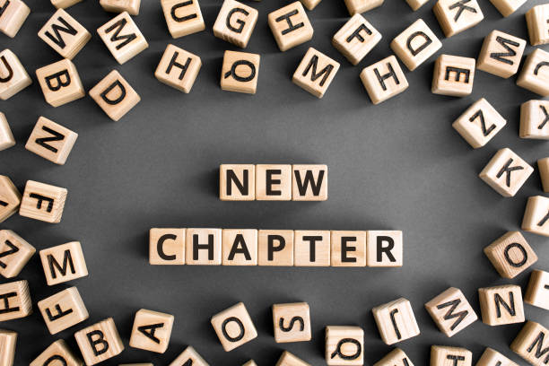 istock new chapter - words from wooden blocks with letters 1175294290