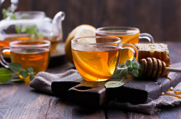 istock cup of tea with mint and honey on a wooden table 1175295149