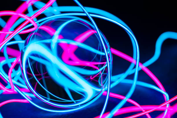 istock neon abstract wires backgroun with glass sphere 1175295401