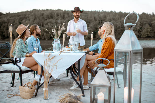 istock Friends dining on the beach 1175297893