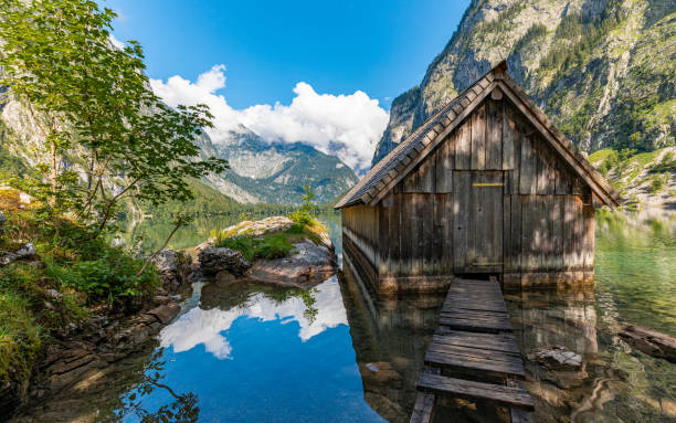 lonesome Boathouse on a beautiful mountainlake stock photo