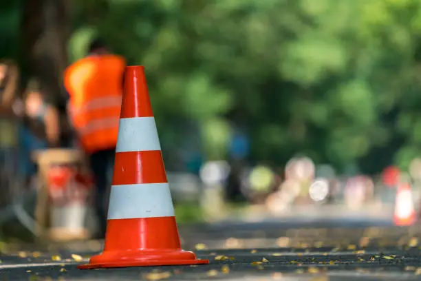 Traffic cone on a street as a warning sign