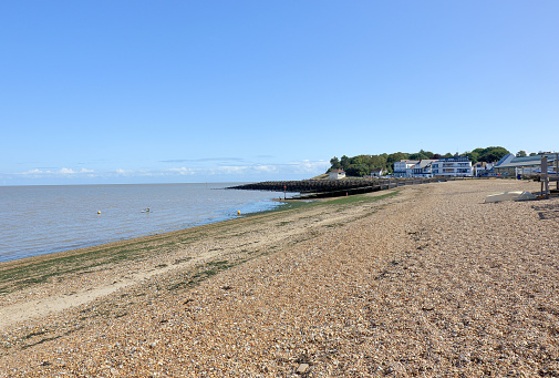 A Landscape scene of the pebbled beach at Tankerton and Whitstable