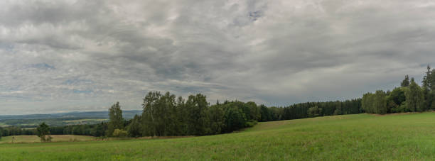 istock Meadows and forests over Sabina village with Ohre river 1175302232