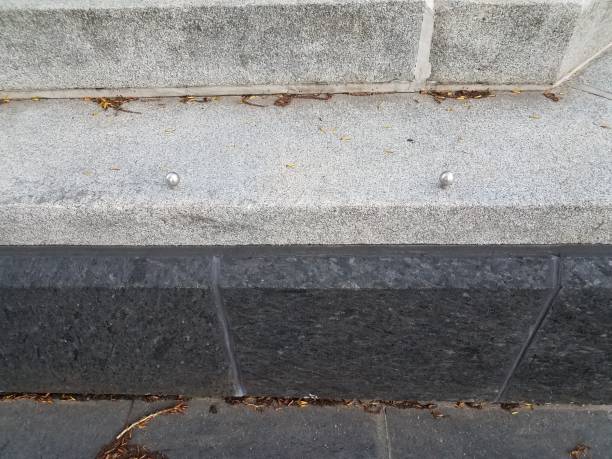 istock cement or granite and balls or spikes to prevent skateboarding 1175302719