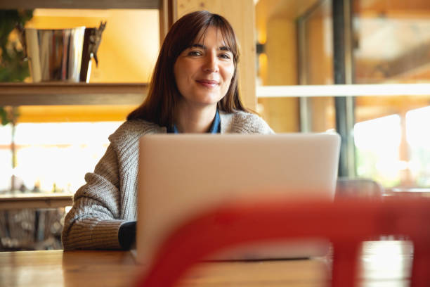 istock Woman working on a laptop 1175305179