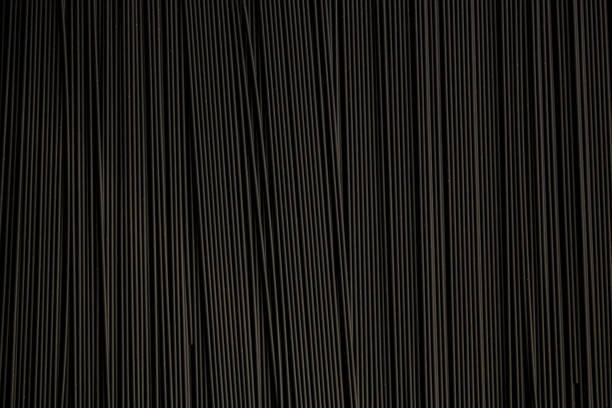 istock black pasta spaghetti (raw product) concept. food background. copy space 1175306395