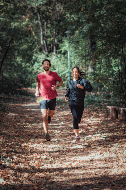 istock Young Couple Jogging, Nature, Outdoors 1175306713
