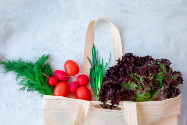istock abstract design background vegetables on a gray background n ecology bag 1175307907