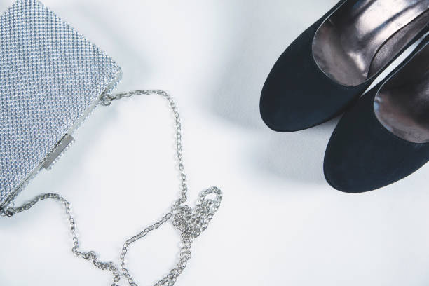 istock woman shoes with bag 1175309403