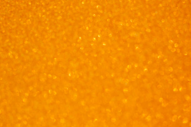 istock abstract blurred background - yellow and green flickering Christmas lights bokeh on Xmas tree 1175309461