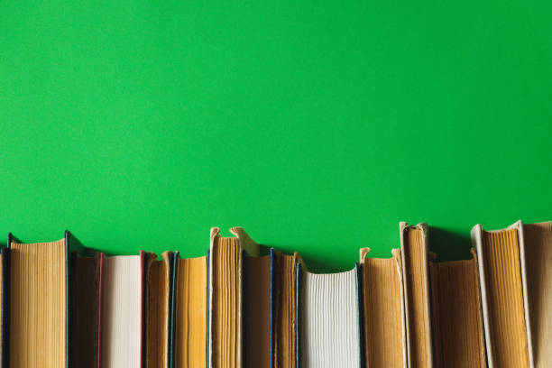 istock old books on a shelf with a light green background 1175315819