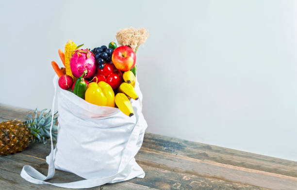 istock vegetables in cotton fabric bag over wooden table 1175317652