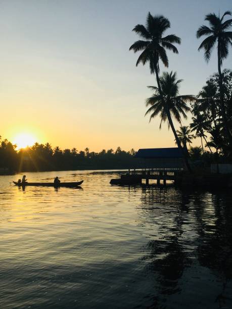 sunrise at allepey backwaters kerala tourismus - allepey stock-fotos und bilder