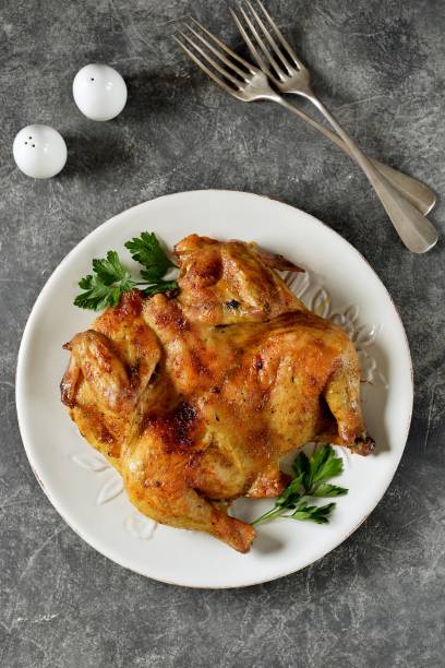 istock Spatchcocked barbecue chicken with spices and garlic 1175327269