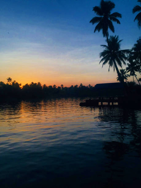 sunrise at allepey backwaters kerala tourismus - allepey stock-fotos und bilder