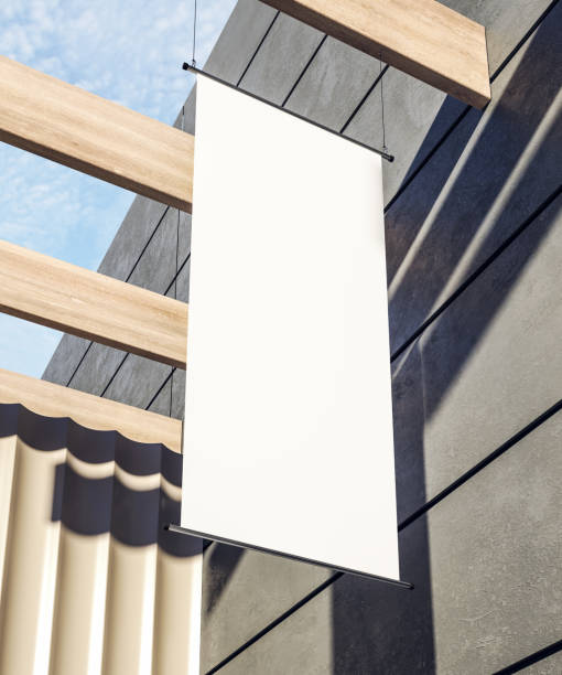 Creative clean poster Creative clean rectangular white stopper poster on building exterior with shadows and sunlight. Advertisement and public concept. Mock up, 3D Rendering hanging signboard stock pictures, royalty-free photos & images