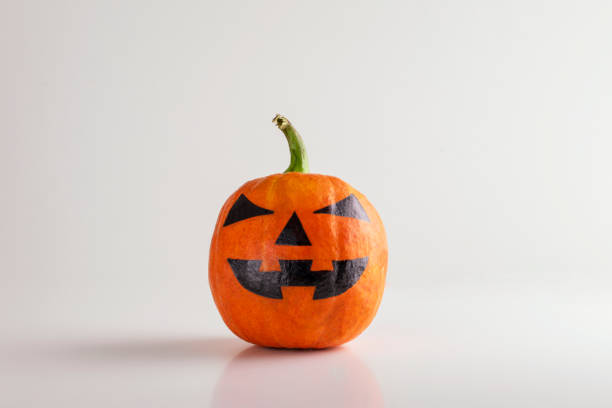 istock Halloween Pumpkin with smile isolated on white background. 1175351172